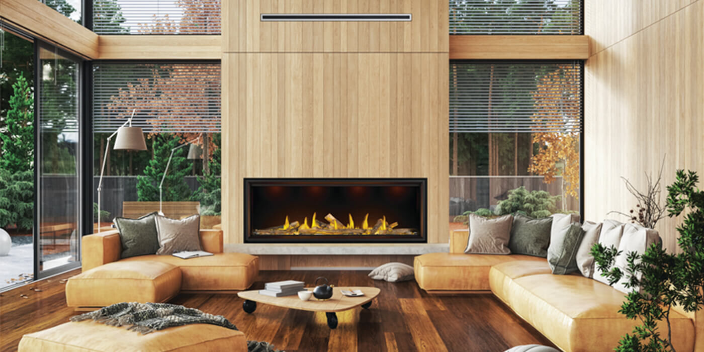 A mid-century modern inspired living room with a large, linear gas fireplace