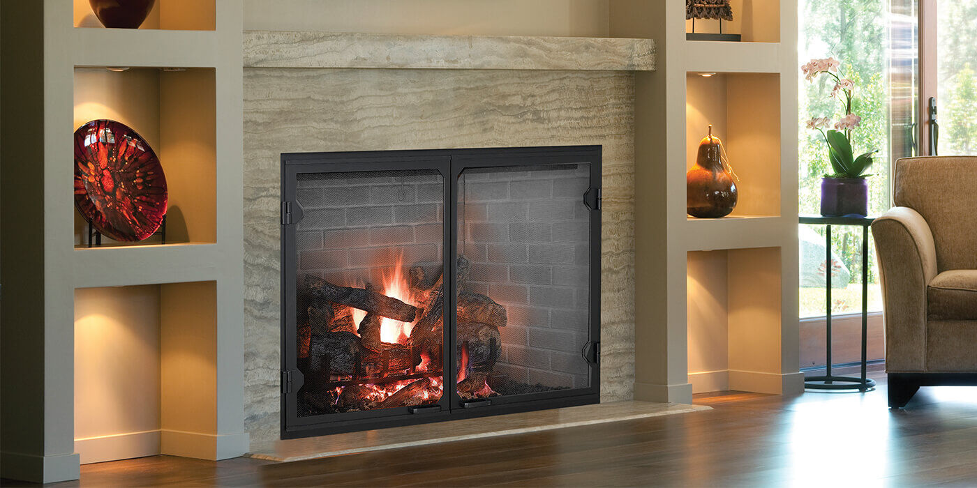 A large, square gas fireplace with modern glass fireplace doors