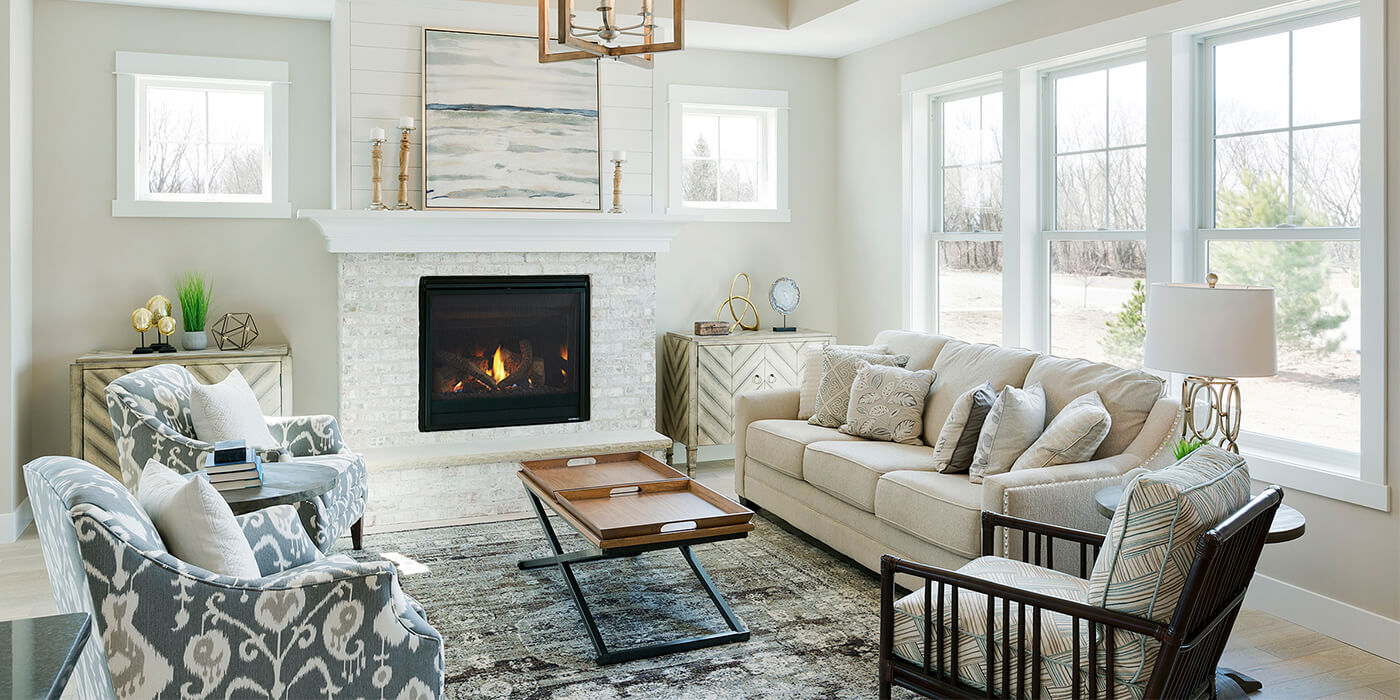 A traditional/transitional living room with a square Direct Vent gas fireplace and classic white mantel