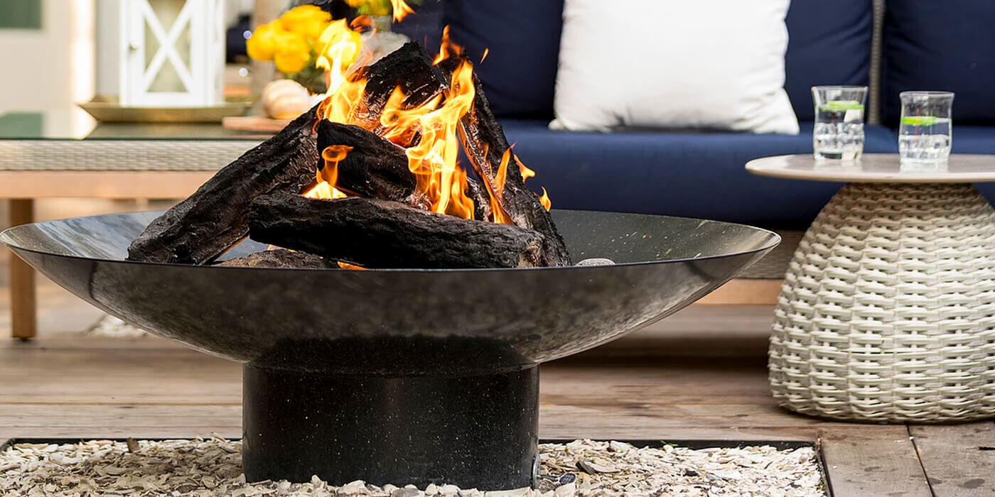 A wood burning fire pit from the brand Fire Pit Art