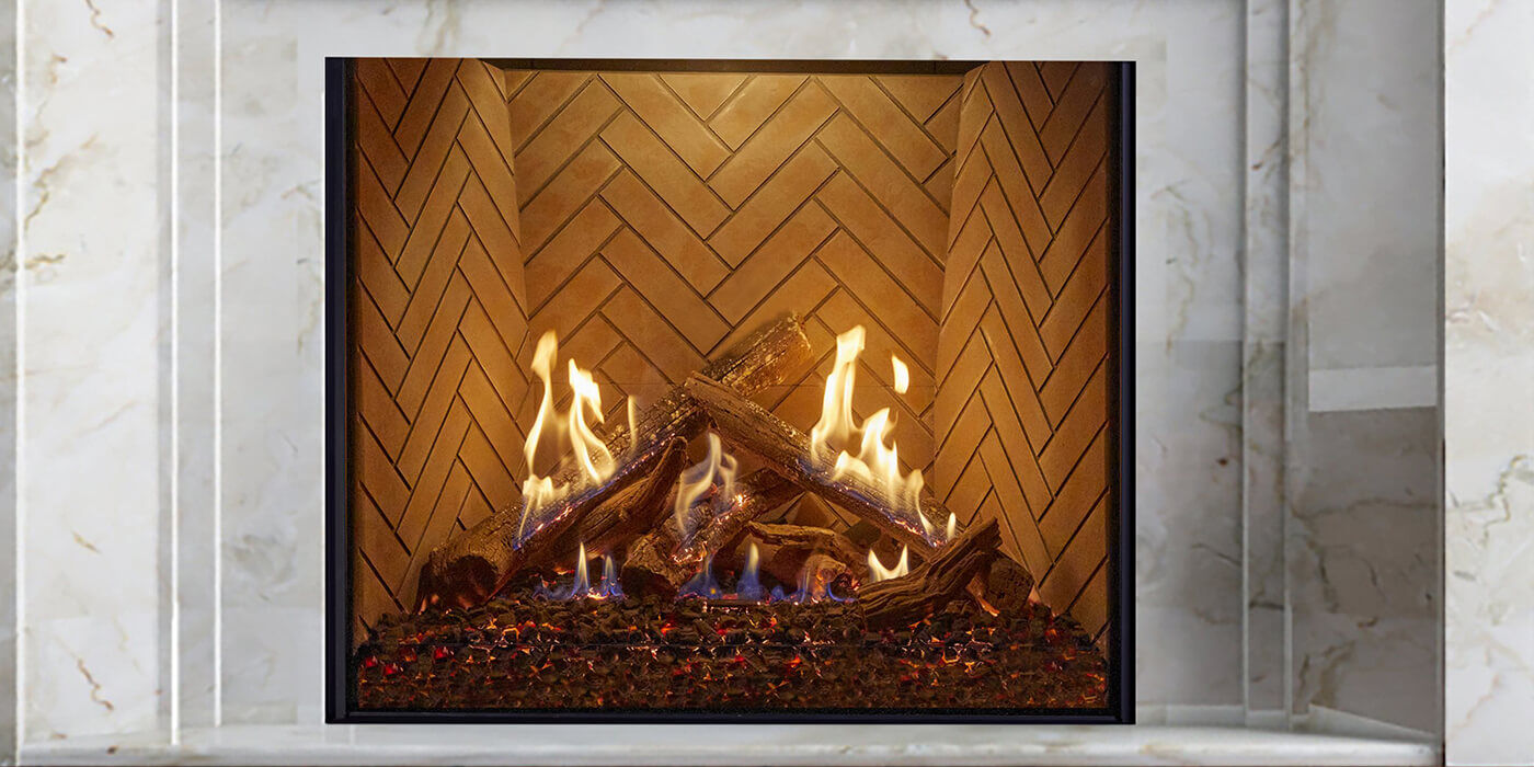 A stack of rustic gas logs in a classic square gas fireplace