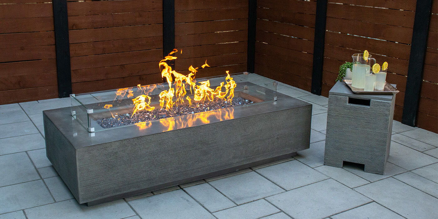 The FlameCraft Zen Rectangular Gas Fire Pit and matching side table Propane enclosure