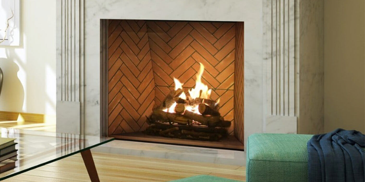 A herringbone brick lined firebox with a Vented gas log set 
