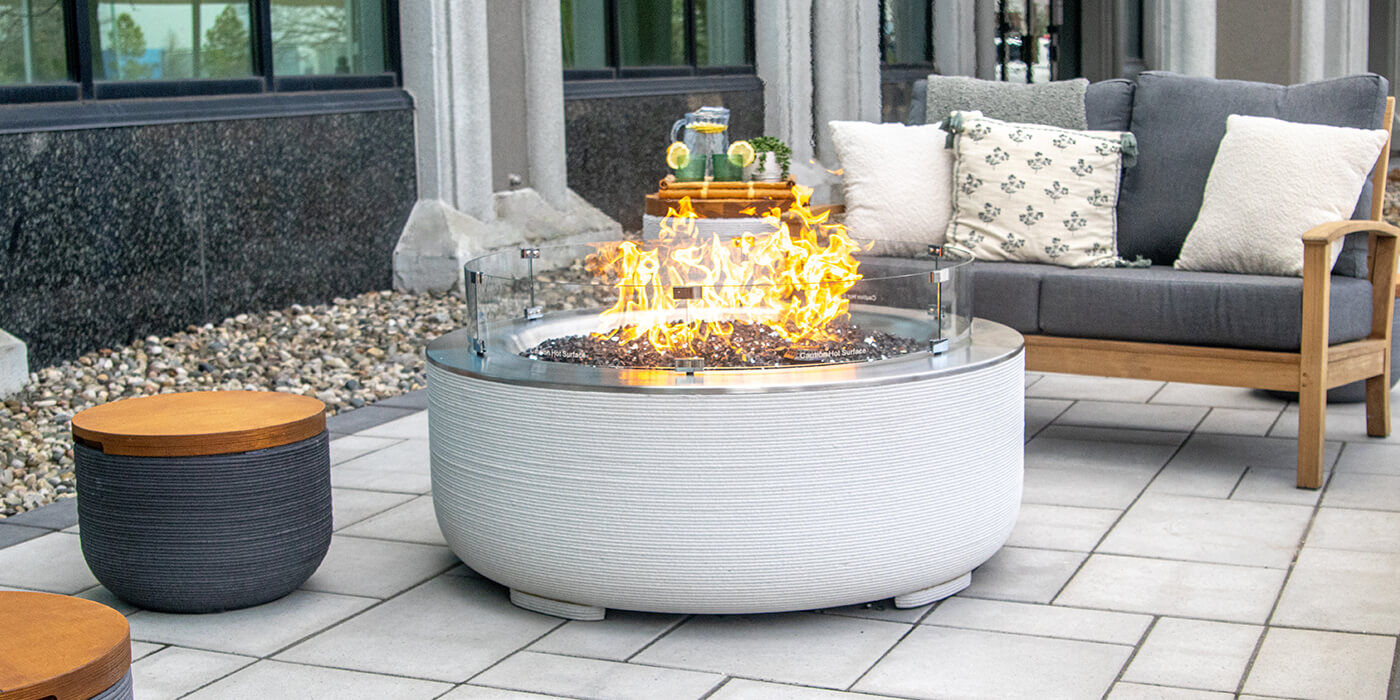 The FlameCraft ReForm Stack Gas Fire Pit, sustainably created using advanced 3-D concrete printing technology