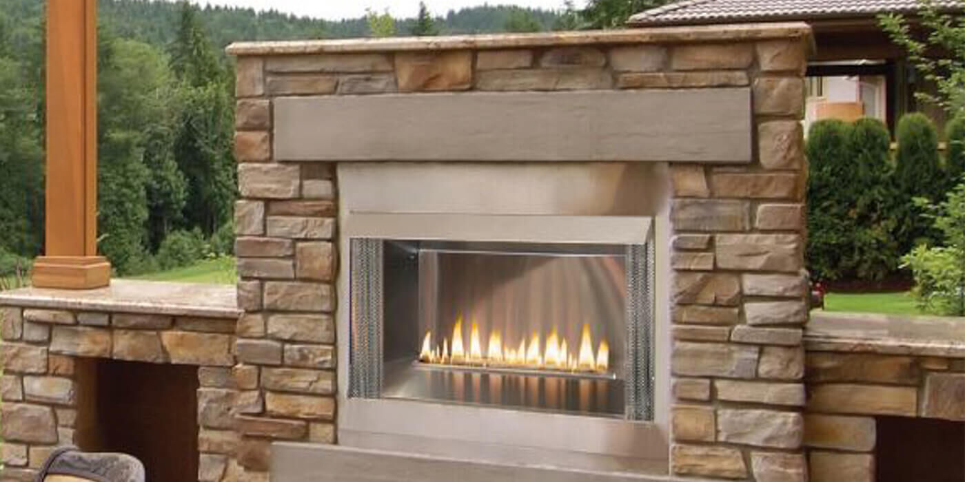 An outdoor gas fireplace